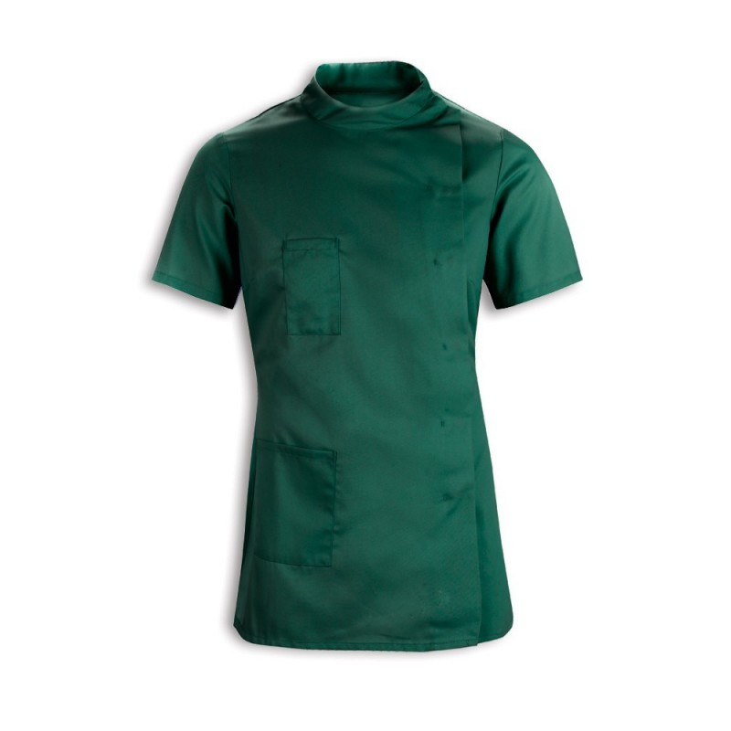Comfortable and conventional women’s dental tunic with a functional design and minimal trim. Simple round collar, asymmetric stud front detail, right side hip and chest pockets, half-belt back. Machine washable and industrially launderable. Available in a choice of colours sizes.